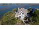 Waterfront home boasts a unique architectural design and large lot at 268 Little Oak Island Dr, Folly Beach, SC 29439