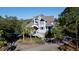 Beautiful waterfront home with private drive and lush landscaping at 268 Little Oak Island Dr, Folly Beach, SC 29439