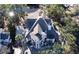 Large home with unique roofline and wrap around porch at 268 Little Oak Island Dr, Folly Beach, SC 29439