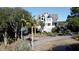 Lovely home nestled amongst palm trees near the water at 268 Little Oak Island Dr, Folly Beach, SC 29439