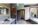 Bathroom with a large vanity and stone sink at 268 Little Oak Island Dr, Folly Beach, SC 29439