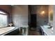 Spa-like bathroom with soaking tub, walk-in shower, and modern vanity at 268 Little Oak Island Dr, Folly Beach, SC 29439