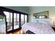 Bedroom with private balcony and water views at 268 Little Oak Island Dr, Folly Beach, SC 29439
