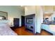Main bedroom with fireplace and hardwood floors at 268 Little Oak Island Dr, Folly Beach, SC 29439