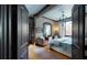 Main bedroom with sitting area and access to the bathroom at 268 Little Oak Island Dr, Folly Beach, SC 29439
