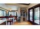 Elegant dining area with wooden table and access to outdoor space at 268 Little Oak Island Dr, Folly Beach, SC 29439
