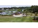 Aerial view of community gazebo with fire pit and seating area near the water at 268 Little Oak Island Dr, Folly Beach, SC 29439