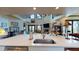 Kitchen island with sink, offering views into the living areas at 268 Little Oak Island Dr, Folly Beach, SC 29439