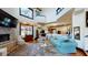 Spacious living room with high ceilings and a fireplace at 268 Little Oak Island Dr, Folly Beach, SC 29439