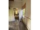 Bedroom with wood floors needing renovation at 5 President Pl, Charleston, SC 29403