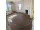 Living room with fireplace, hardwood floors, needs complete renovation at 5 President Pl, Charleston, SC 29403