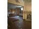 Damaged living room with exposed walls and debris at 5 President Pl, Charleston, SC 29403