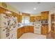 Classic kitchen with wood cabinets and corner sink at 1447 Fort Lamar Rd, Charleston, SC 29412