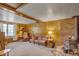 Living room with wood paneling, couch, and wood-burning stove at 1447 Fort Lamar Rd, Charleston, SC 29412