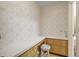 Small vanity area with wood cabinets and a white countertop at 1447 Fort Lamar Rd, Charleston, SC 29412