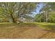 Large backyard with shed and mature trees at 1447 Fort Lamar Rd, Charleston, SC 29412