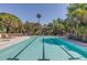 Inviting resort-style pool with spacious deck at 154 Lake Timicau Ln, Dewees Island, SC 29451