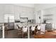 Modern kitchen with stainless steel appliances and a large island with seating at 3115 Ion Ave # B, Sullivans Island, SC 29482