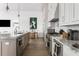 Modern kitchen featuring granite counters and stainless steel appliances at 3115 Ion Ave # B, Sullivans Island, SC 29482