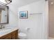 Clean bathroom with a marble vanity, shower, and toilet at 3115 Ion Ave # B, Sullivans Island, SC 29482