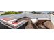 Relaxing rooftop deck with outdoor seating and ocean views at 3115 Ion Ave # B, Sullivans Island, SC 29482
