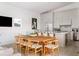 Kitchen with farmhouse dining table and chairs at 3115 Ion Ave # B, Sullivans Island, SC 29482