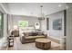 Spacious main bedroom with a sitting area and ensuite bathroom at 3115 Ion Ave # B, Sullivans Island, SC 29482