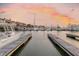 Beautiful sunset over the marina with many boats at the dock at 1880 Andell Bluff Blvd # D-16, Seabrook Island, SC 29455
