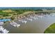 Aerial view of a waterfront community and marina with numerous boats at 1880 Andell Bluff Blvd # D-16, Seabrook Island, SC 29455