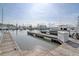 Wooden docks with boats and calm water at 1880 Andell Bluff Blvd # D-16, Seabrook Island, SC 29455