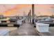 Wooden dock with boats at sunset at 1880 Andell Bluff Blvd # D-16, Seabrook Island, SC 29455