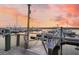 Dock at sunset with boats and a sign for boat owners at 1880 Andell Bluff Blvd # D-16, Seabrook Island, SC 29455
