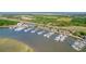 Aerial view showing marina, boat slips, and waterfront homes at 1880 Andell Bluff Blvd # D-16, Seabrook Island, SC 29455