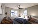 Bedroom with a queen-size bed, dresser, and large windows at 516 Hayes Park Blvd # 1, Johns Island, SC 29455
