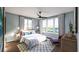Bedroom with queen bed, window seating and ceiling fan at 516 Hayes Park Blvd # 1, Johns Island, SC 29455
