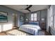 Bright bedroom with a queen-size bed, wood nightstands, and a ceiling fan at 516 Hayes Park Blvd # 1, Johns Island, SC 29455