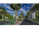 Street view of charming homes with lush landscaping and palm trees at 516 Hayes Park Blvd # 1, Johns Island, SC 29455