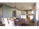 Kitchen and dining area featuring a farmhouse table and modern lighting at 516 Hayes Park Blvd # 1, Johns Island, SC 29455