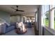 Spacious living room with sectional sofa, large windows, and open floor plan at 516 Hayes Park Blvd # 1, Johns Island, SC 29455