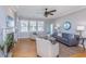 Bright and airy living room with hardwood floors and a cozy atmosphere at 301 Flowering Peach # 203, Charleston, SC 29414