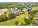 Aerial view of community near golf course and water at 301 Flowering Peach # 203, Charleston, SC 29414