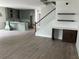 Open living space with hardwood floors and built-in shelving at 200 Saunter Ct # 30, Johns Island, SC 29455