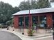 Somm Wine Bar's inviting patio features string lights and comfy seating at 200 Saunter Ct # 30, Johns Island, SC 29455
