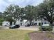 New home community with tree-lined streets and parking at 200 Saunter Ct # 30, Johns Island, SC 29455