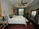 Elegant Primary bedroom with a canopy bed, large mirror, and stylish decor at 420 Eagleview Dr, Moncks Corner, SC 29461
