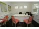 Home office with built-in desk and two chairs at 420 Eagleview Dr, Moncks Corner, SC 29461
