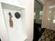White built-in coat closet with seating and hooks at 420 Eagleview Dr, Moncks Corner, SC 29461