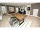 Spacious loft office with built-in shelving, large table, and comfortable seating at 420 Eagleview Dr, Moncks Corner, SC 29461