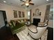 Spacious living room with a fireplace, hardwood floors, and a comfortable seating area at 420 Eagleview Dr, Moncks Corner, SC 29461