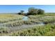 Tranquil marsh views with tidal creek at 1075 Capersview Ct, Awendaw, SC 29429